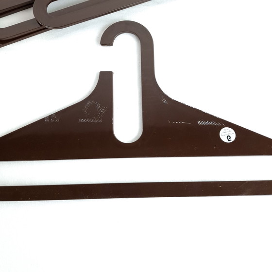 Image 1 of 4x Vintage dark brown space age clothes hanger Danilo Silvestrin Lambert