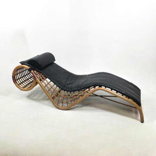 Chaise longue Flechtatelier Schütz en rotin et cuir. Design des années 70.