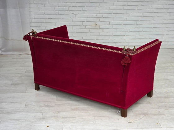 Image 1 of 1970, Deense 2-zits "Spaanse" drop arm sofa, kersenrood meubelvelours.