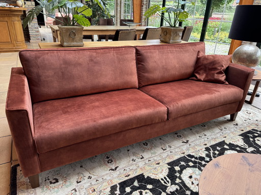 Four-seater sofa with copper-colored velour