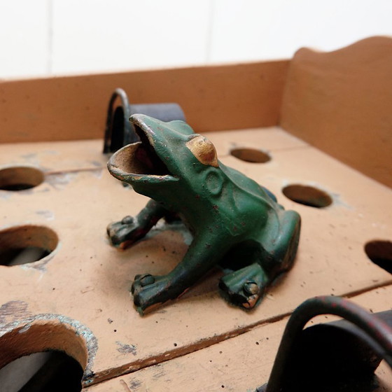 Image 1 of "The Frog Game", an old game made of wood and painted iron, early 20th century