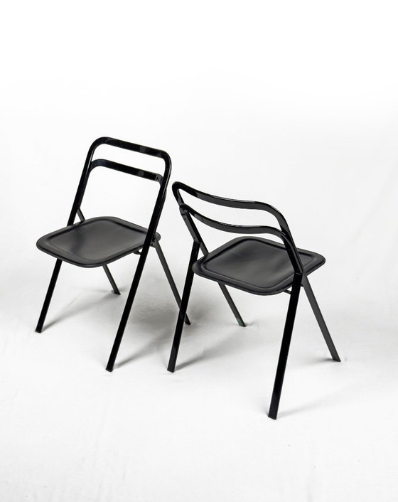 Image 1 of 4x Black metal and leather “Clio” folding chairs by Giorgio Cattelan