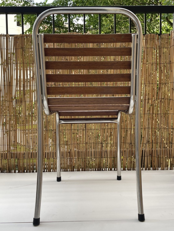 Image 1 of Franse bistrostoelen stapelbaar (set van 4) van chroom en hout