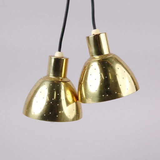 Hans-Agne Jakobsson for Markaryd – Pair of T618 perforated brass pendant lights – Sweden, 1960s