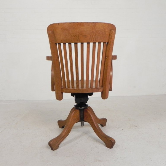 Silla de oficina de roble con sistema de muelles ajustable y regulación de altura, década de 1950. (photo 12 of 35)