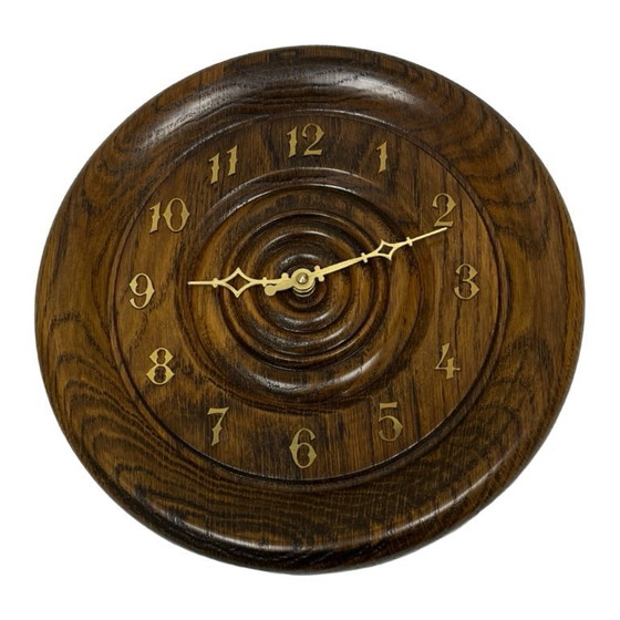 Image 1 of Vintage round oak wall clock carved turned wood retro Germany 1980s.