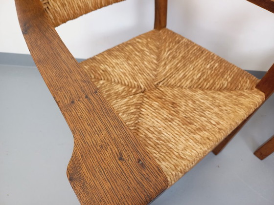 Image 1 of Suite van 2 vintage Brutalistische fauteuils in eiken en stro uit de jaren 60