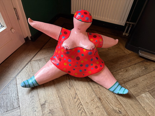 Lady in an orange dress by Trijnie Wubbolt