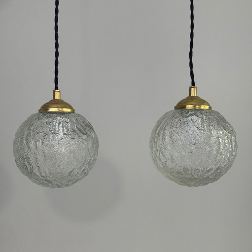 PAIR OF VINTAGE ROUND GLASS PENDANTS