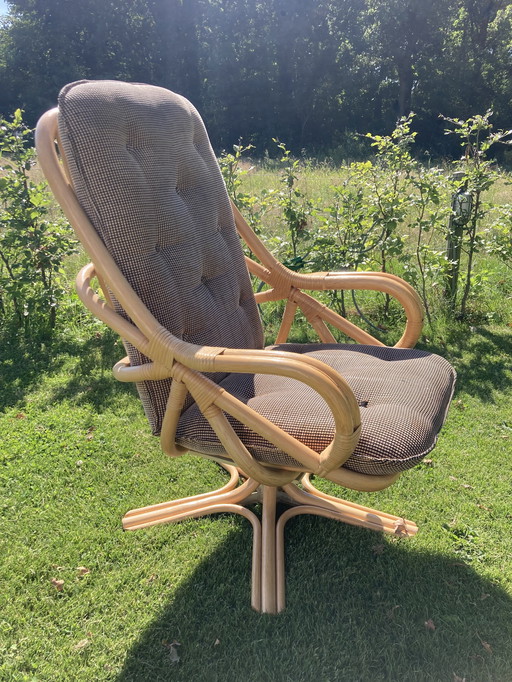 Vintage bohemian bamboo swivel armchair