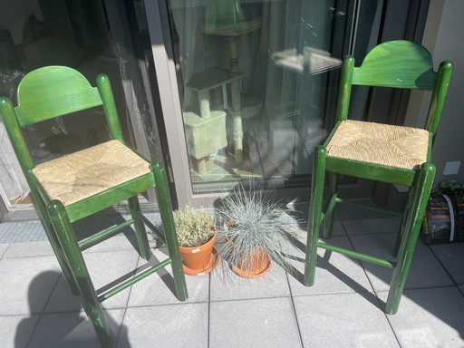2x Vintage green lacquered rush-seat bar stools. Attributed to Hank Loewenstein Padova / Vico Magistretti Carimate style.