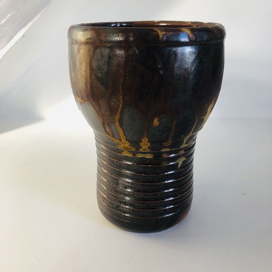 Image 1 of Vaso a torso in ceramica smaltata metallizzata