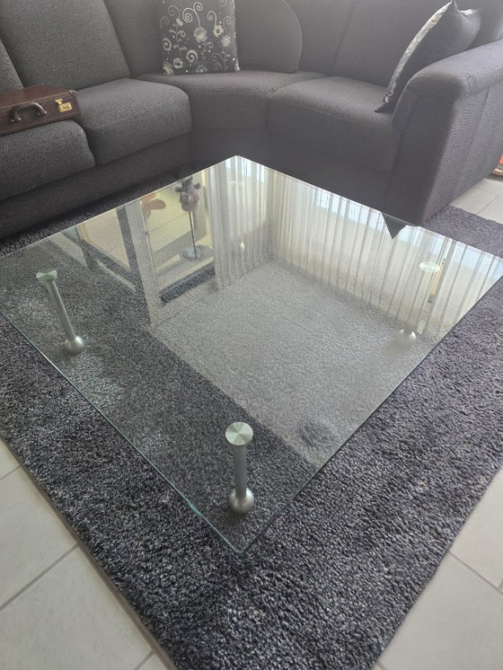Image 1 of Design glass table with stainless steel legs; square model