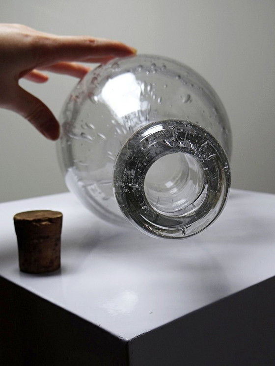 Image 1 of Large antique bottle in blown glass with bubbles, early 20th century, 1900-1920