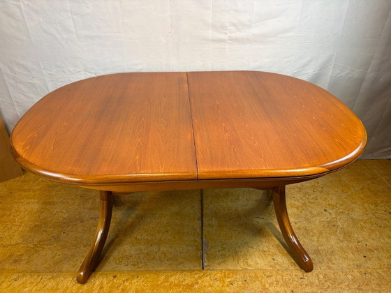 Image 1 of Mid Century Retro Teak Oval Danish Extending Dining Table (Circa 1960–1970)  A stunning mid century modern teak oval extending d