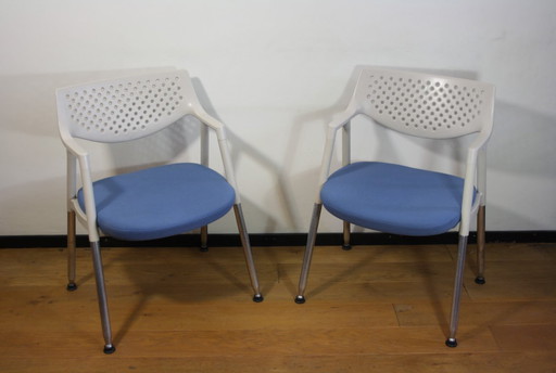 Two Vitra Quattro chairs