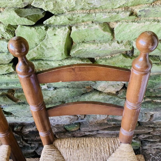 Image 1 of Set van 4 massief houten stoelen met rieten zittingen