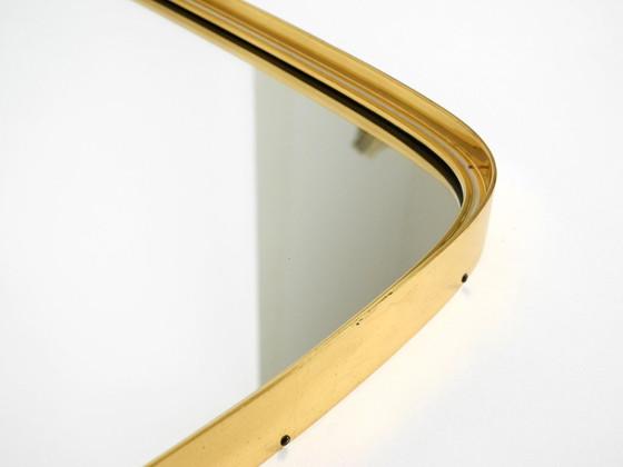 Image 1 of A pair of rare original Mid Century Modern "Münchener Zierspiegel" wall mirrors with heavy brass frames