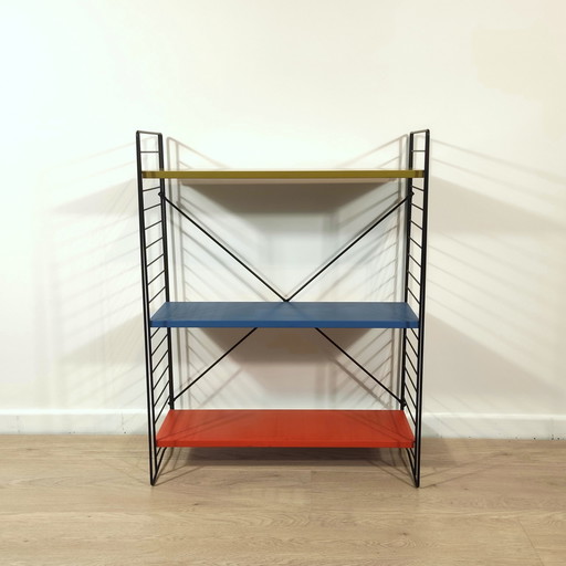 Mid century free standing rack with metal shelves by A. Dekker for Tomado