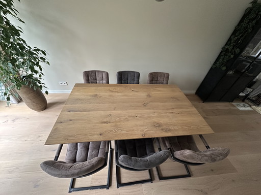 Solid wood dining table with steel spider legs and 6 chairs
