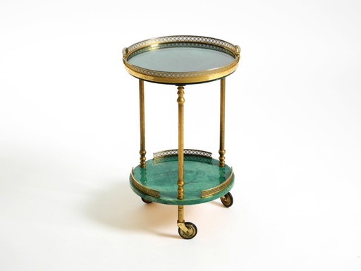 Round, small 1960s Aldo Tura serving or bar trolley in green goatskin leather | Made in Italy