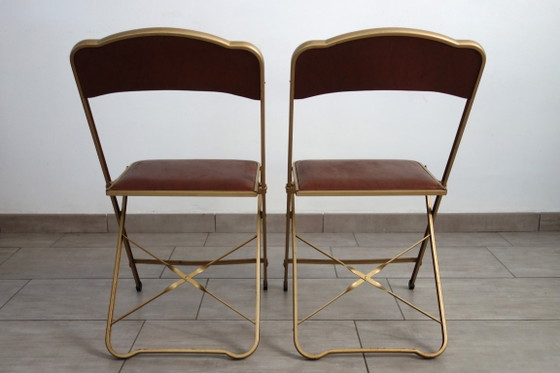 2 Stühle aus vergoldetem Metall und Skai im Opern-Stil der 60er/70er Jahre – Klappstühle (photo 5 of 13)