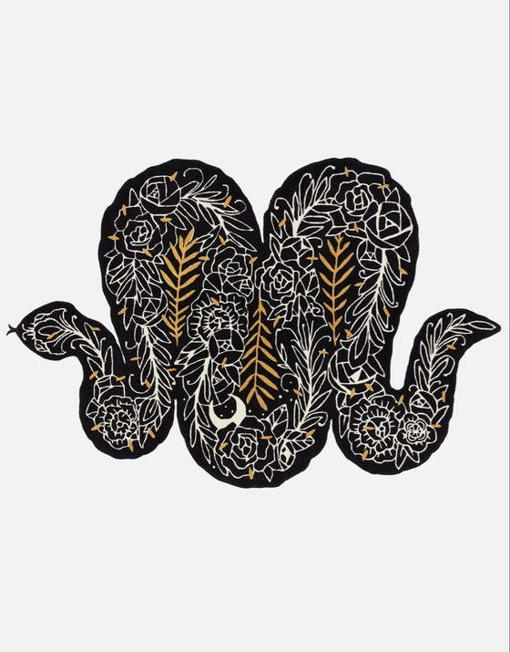 Image 1 of Evento artistico Ikea x tappeto a forma di serpente Supakitch