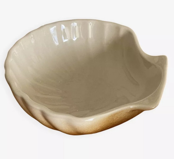 Image 1 of Brown shell saucer