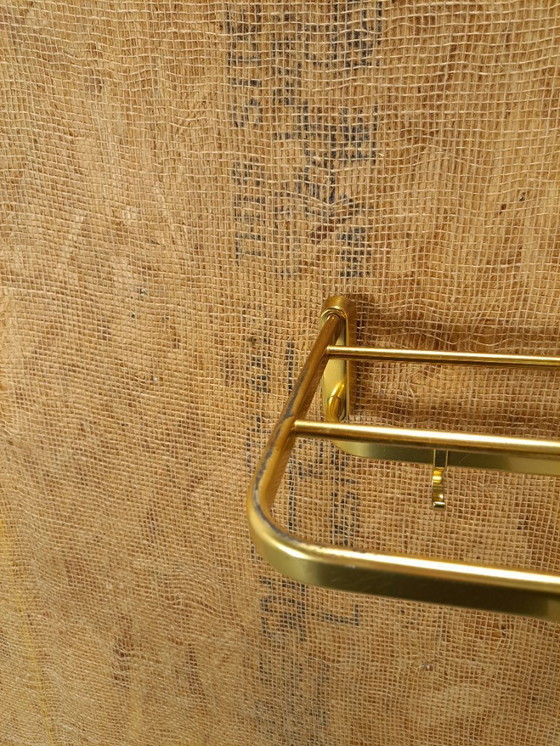 Image 1 of Porte-manteau en forme de train, couleur or, avec crochets, n° 18