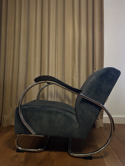 Blue velvet armchair