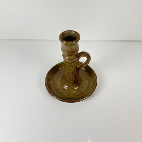 Image 1 of Handkandelaar van steengoed