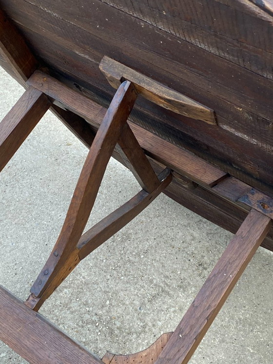 Image 1 of antique folding round winemaker's target table with tilting top