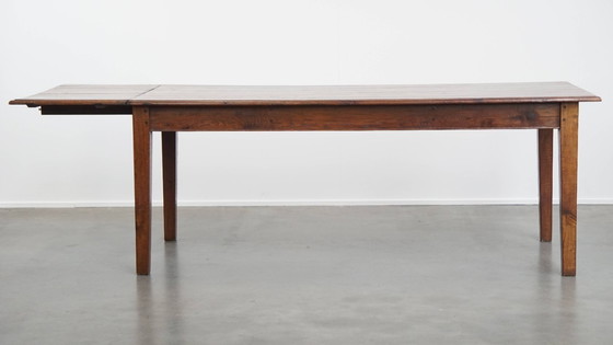 Image 1 of Table de salle à manger ancienne en chêne du début des années 1900 avec plateau rabattable d'un côté