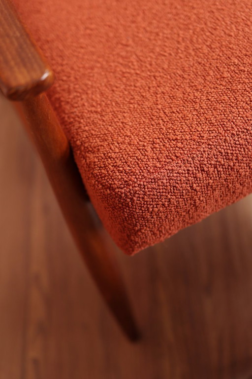 Scandinavian armchair and footrest papaya orange boucle design by H.Lis