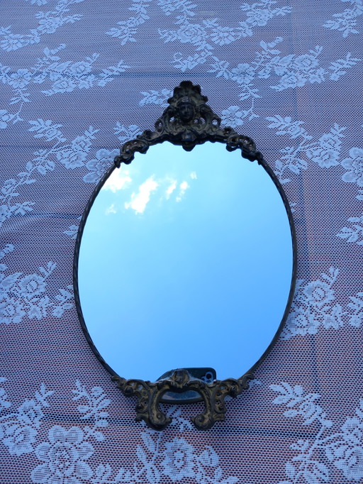 Miroir ovale vintage avec cadre en laiton bronze