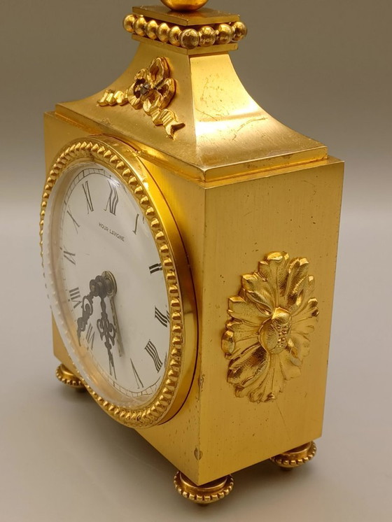 Image 1 of Pendule horloge d'officier de style Louis XVI en bronze ciselé et doré, cadran signé Hour Lavigne. 
