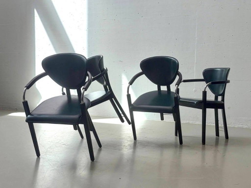 Italian vintage stiletto armchairs in leather, 1980s – kuipstoelen
