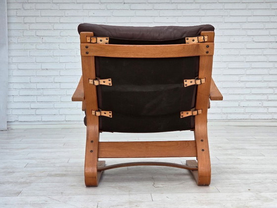 Image 1 of Fauteuil danois des années 1970 de la marque Komfort, cuir, toile et bois courbé.