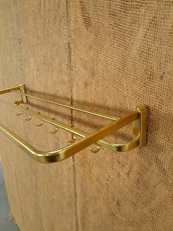 Image 1 of Porte-manteau en forme de train, couleur or, avec crochets, n° 18