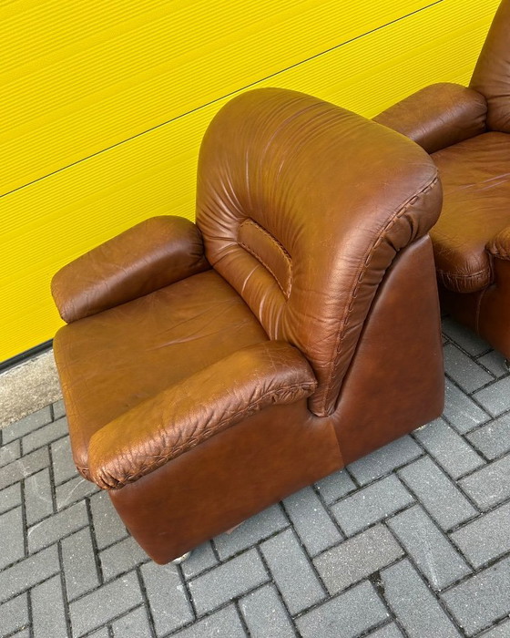 Vintage brown leather Danish lace Armchairs 70s (photo 12 of 21)