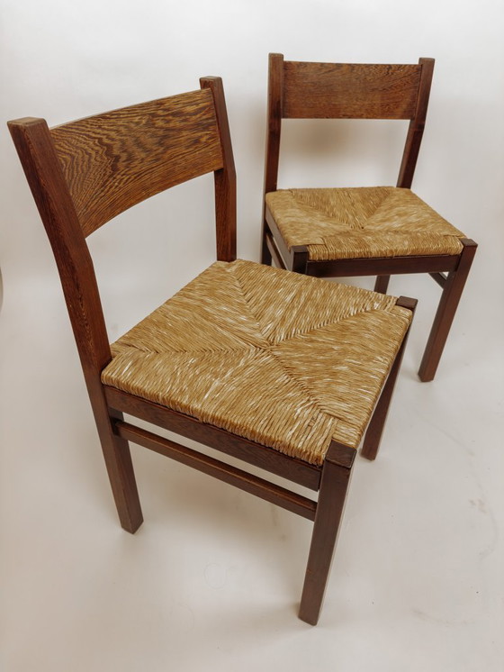 Image 1 of 2x Vintage wengé houten eetkamerstoelen met gevlochten zitting
