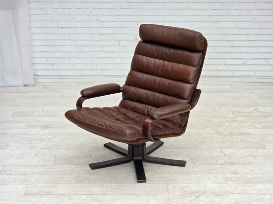 Image 1 of Anni '70, poltrona girevole danese di Georg Thams, in pelle marrone.