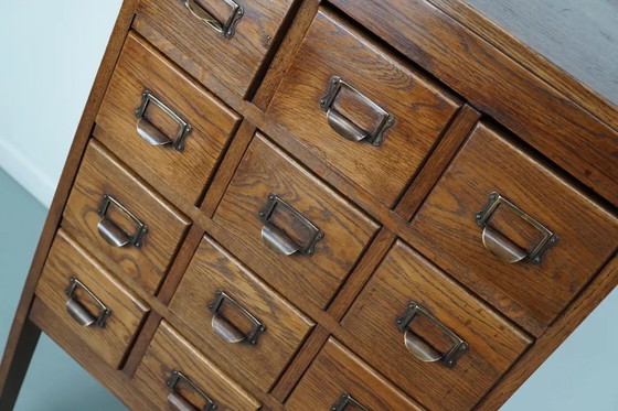 Image 1 of Antieke Nederlandse eiken apothekers- / archiefkast, jaren 1930