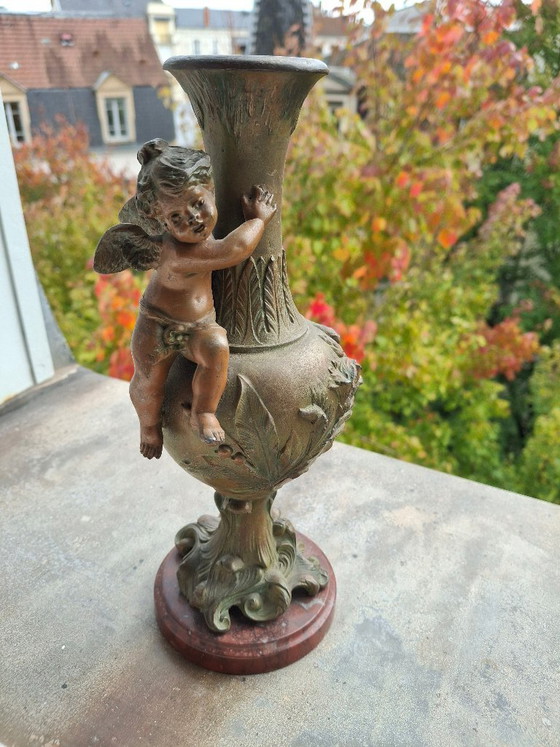 Image 1 of Pair of Art Nouveau spelter vases, circa 1900, with cherubs and a double patina