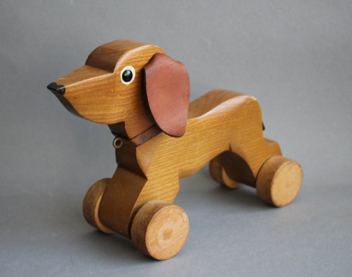 Pull-along dachshund toy with leather ears, wooden figure, vintage decoration, old toy