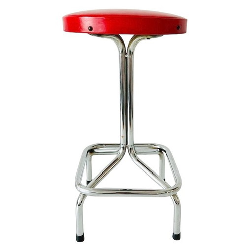 Tabouret vintage à structure tubulaire chrome rouge