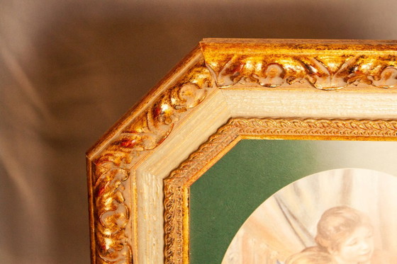 Image 1 of Panneau en bois sculpté orné d'une reproduction de Renoir. Cadre hexagonal.