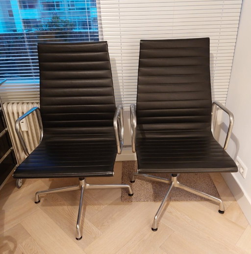 2x Vitra EA112 black leather chairs