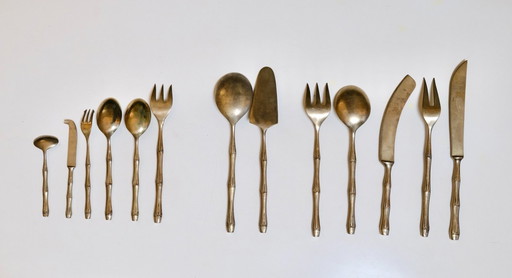 A 140-piece brass cutlery set from the 1970s