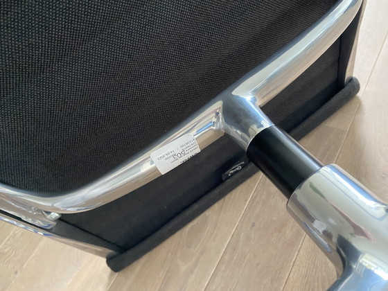 Vitra AE 124 Lounge Chair + AE 125 Footstool – Chairs and lounge chairs, Textile, Aluminium (photo 5 of 6)